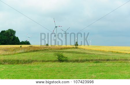 Wind-driven Generator In The Middle Of A Field