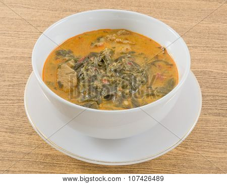 Thai Coconut Milk Curry With Cassia Leaves And Pork