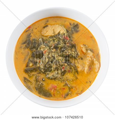 Top View Coconut Milk Curry With Cassia Leaves On White