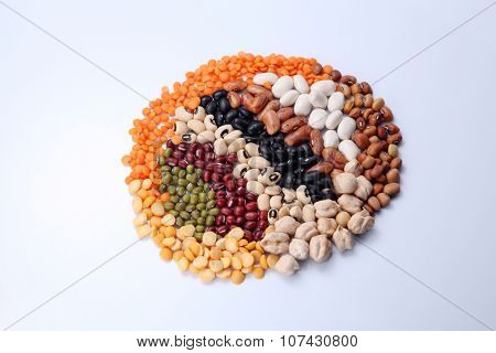 assorted beans arranged in a round shape