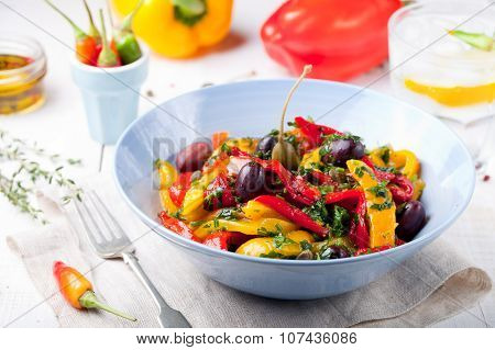 Roasted yellow and red bell pepper salad. Grilled vegetables.