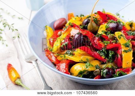 Roasted yellow and red bell pepper salad. Grilled vegetables.