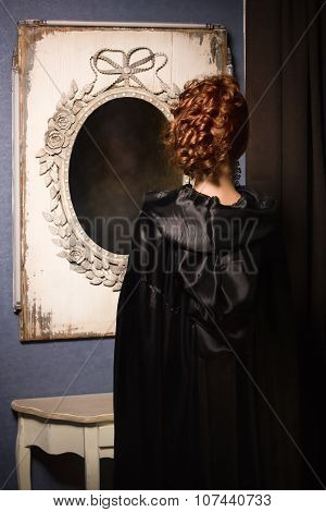 Pretty Woman Vamp Looking At Mirror