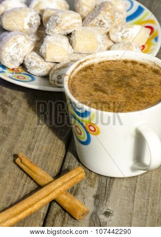 Hot Chocolate With Cinnamon And Crescent Rolls Stuffed With Walnut On Wood