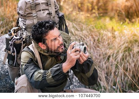 Handsome Young Hiker With Camera