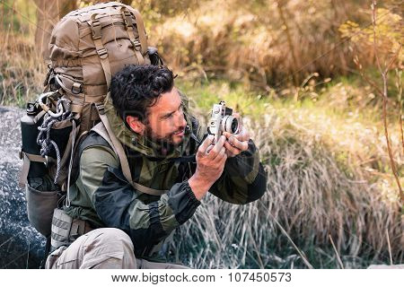 Handsome Young Hiker With Camera