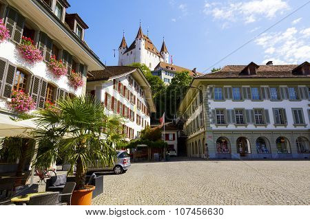 Thun Castle Towering Over The Town Hall Square