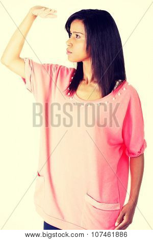 Young woman looking farr away.