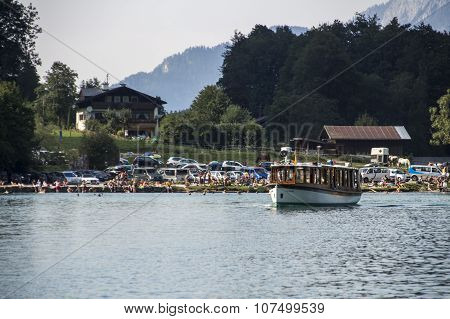 KOENIGSSEE, GERMANY - AUGUST 13, 2015: Electric pleasure boats operating on the Koenigssee lake and commute between Schoenau St. Bartholomew and Salet