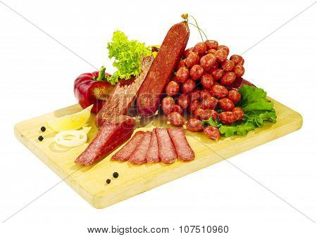 Still life - sausage on the board isolated