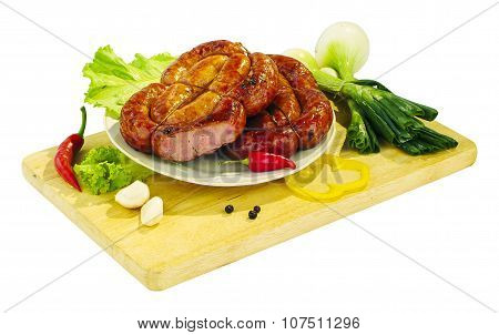 Still life - sausage on the board isolated