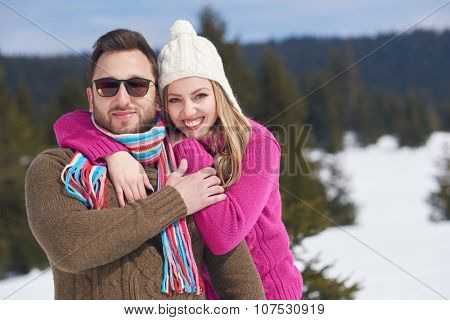 portrait of happy young romantic tourist  couple outdoor in nature at winter vacation