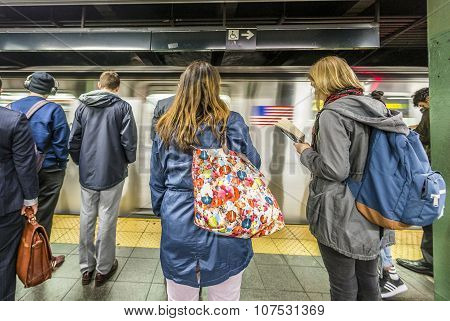 People Wait At Subway Station Times Square In New York