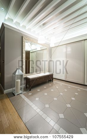 Spacious Anteroom Interior In Warm Tones And Modern Ceiling Lights