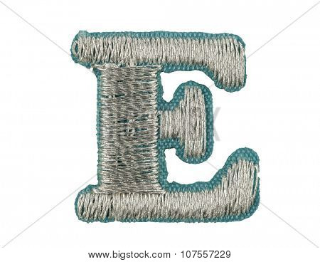 Fonts that are stitched with thread isolated on white capitol letter E