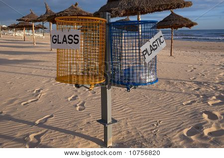 Separate Waste Baskets On The Beach