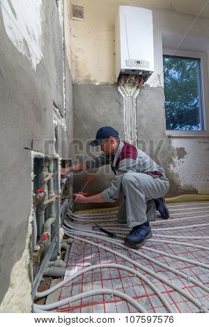 pipefitter installing system of heating