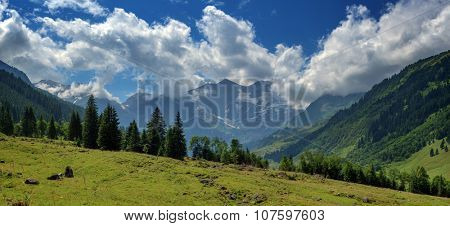 Beautiful view from top of mountain pass. Alps, Europe.