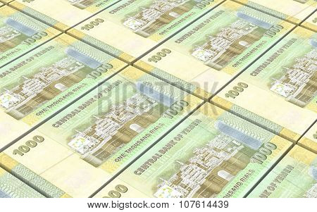 Yemeni rials bills stacked background. Computer generated 3D photo rendering.