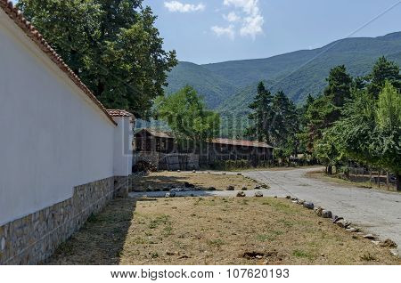 Fence of antique and new part at churchyard,  Batkun Monastery