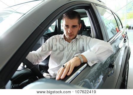 Handsome Man In His New Car