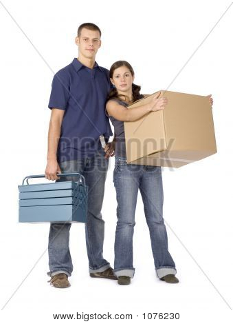 Renovación de la casa - pareja con caja y caja de herramientas