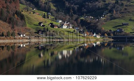 Innerthal, Little Village In Schwyz Canton Mirroring In Lake Wagital