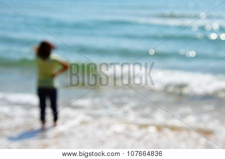 blurry woman on the sea