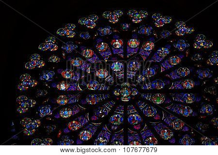 PARIS, FRANCE - SEPTEMBER 9, 2014: Paris Notre Dame Cathedral. South transept rose window. UNESCO World Heritage Site. Paris France