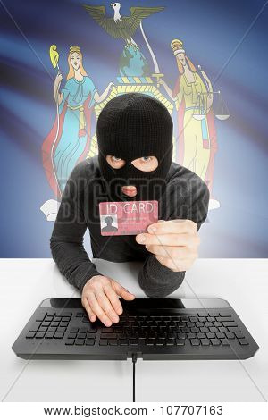Hacker With Usa States Flag On Background And Id Card In Hand - New York