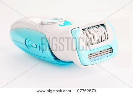 depilator and razor on white - beauty treatment
