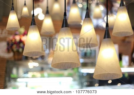 Warm Lighting Modern Ceiling Lamps In The Cafe.
