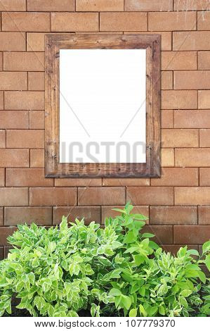 Brown Brick Wall Foully And Photo Frame.