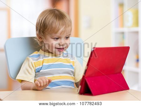 Little boy with tablet computer
