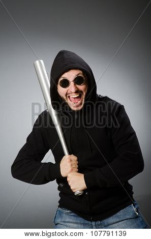 Aggressive man with basebal bat 