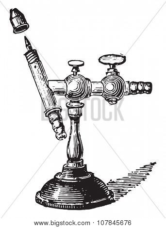 Mouth-operated torch, vintage engraved illustration. Industrial encyclopedia E.-O. Lami - 1875.