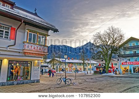 GARMISCH-PARTENKIRCHEN GERMANY - JANUARY 06 2015: View of the street in Garmisch-Partenkirchen an idyllic mountain resort in the valleys of the Bavarian Alps beneath the towering Zugspitze peak