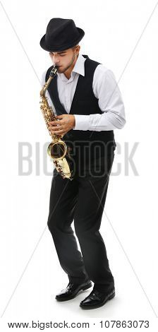 Happy saxophonist plays music on sax in elegant suit on white background