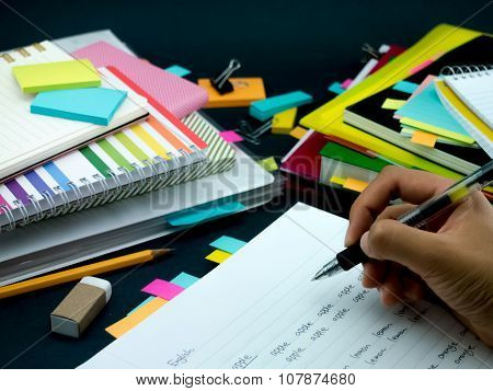 Learning New Language Writing Words Many Times On The Notebook; English