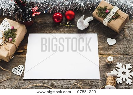 Cute vintage christmas new year gifts mock up on wooden background.