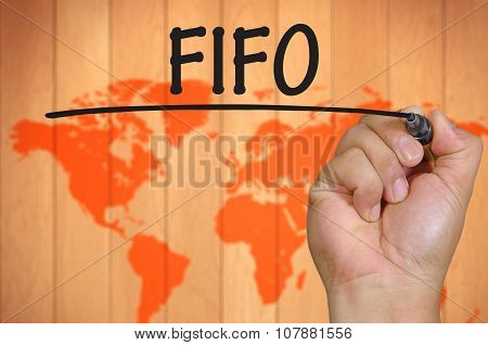 Hand Writing Fifo Over Blur World Background