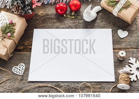 Cute vintage christmas new year gifts mock up on wooden background.