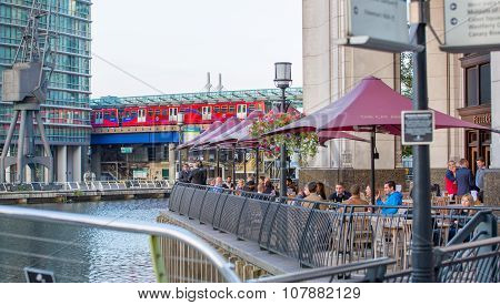 LONDON, UK - SEPTEMBER 9, 2015: DLR train running through the  Canary Wharf business and banking ari