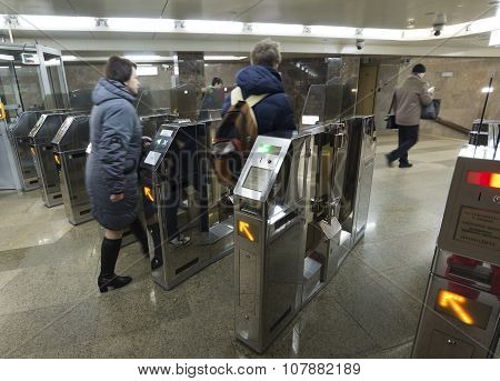 Nizhny Novgorod RUSSIA - 02.11.2015. People go through Turnstiles at the Gorkovskaya metro station.