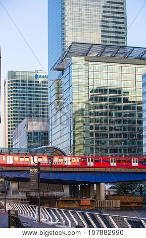 LONDON, UK - SEPTEMBER 9, 2015: DLR train running through the  Canary Wharf business and banking ari