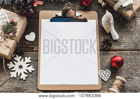 Cute vintage christmas new year gifts mock up on wooden background.