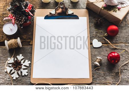 Cute vintage christmas new year gifts mock up on wooden background.