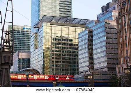 LONDON, UK - SEPTEMBER 9, 2015: DLR train running through the  Canary Wharf business and banking ari