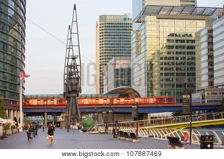 LONDON, UK - SEPTEMBER 9, 2015: DLR train running through the  Canary Wharf business and banking ari
