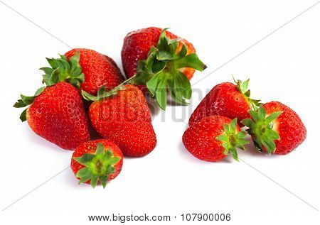 big red juicy rich strawberries with pedicle